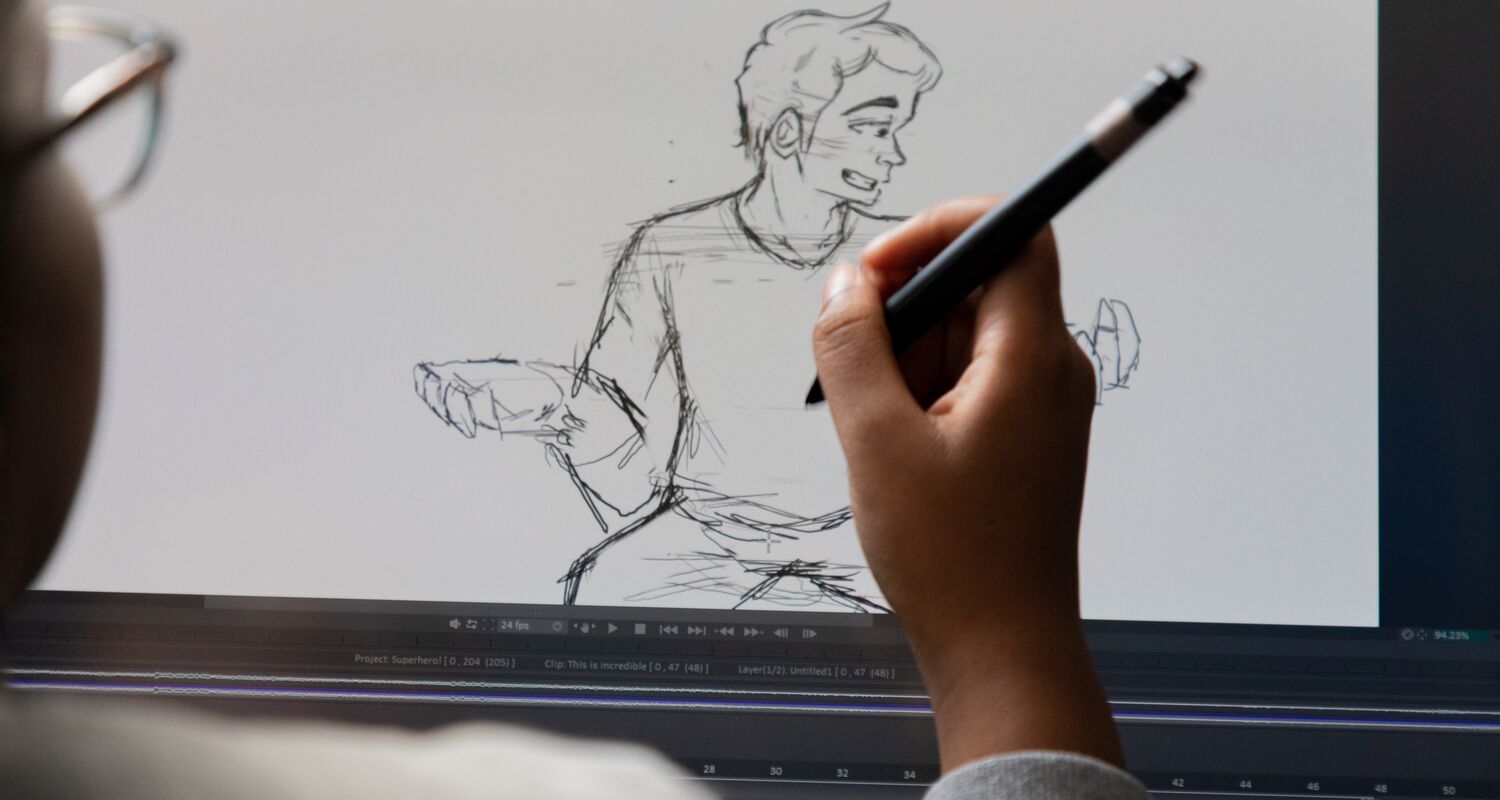 一名学生用平板电脑画出一个男性形象